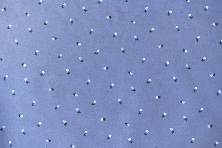 Baumwollstoff grau/lila mit Streublümchen